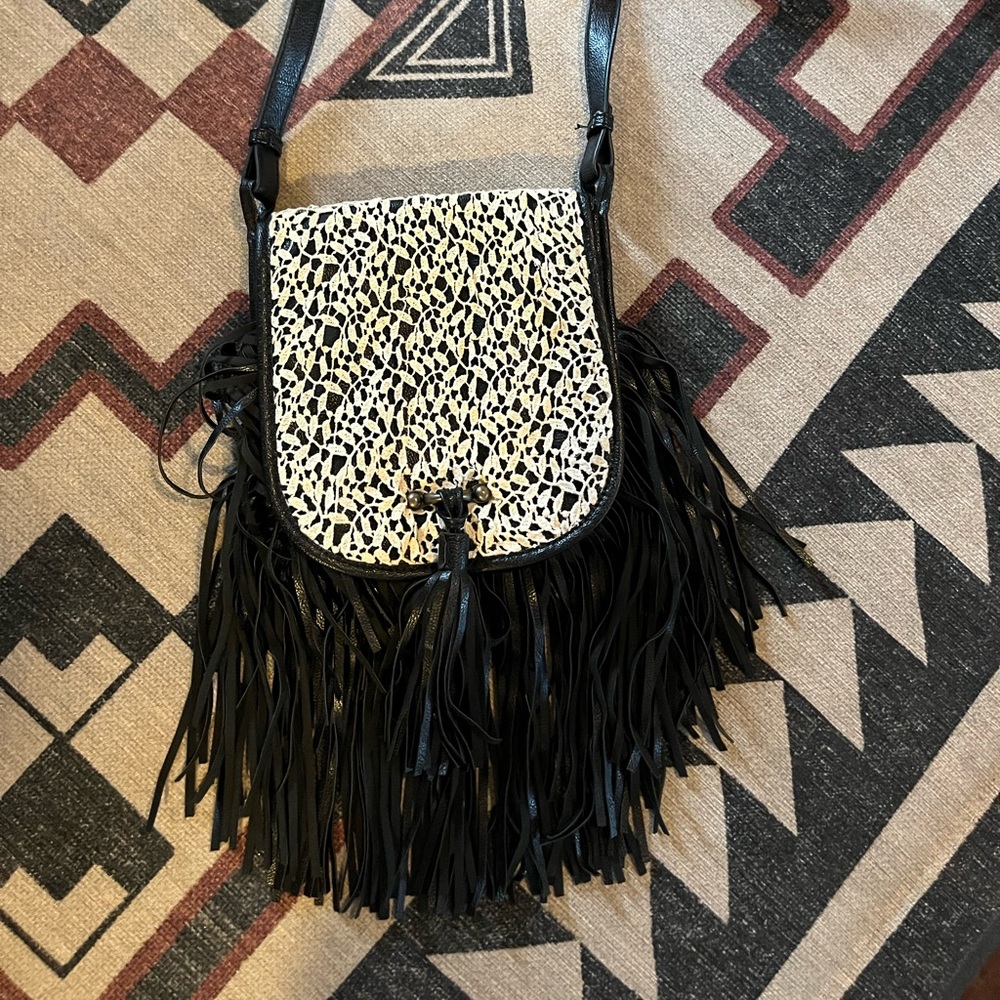 Madden fringe and lace cross body